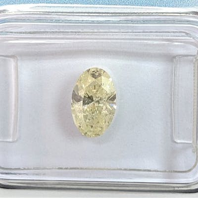Download Free Diamond 0 90 Ct Oval Fancy Light Yellow I2 Barnebys PSD Mockup Template