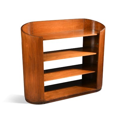 An Art Deco Walnut Bookshelf The Curved Ends Enclosing Four Open
