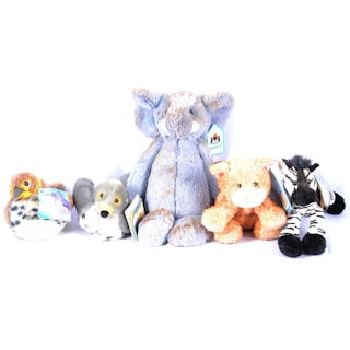Tiger Electronics 'FurReal Friends' Biscuit, with other plush toys