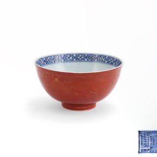 A Chinese 'Kinrande' and iron-red decorated blue and white bowl