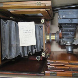 Old cameras and equipment, including a bellows camera and others